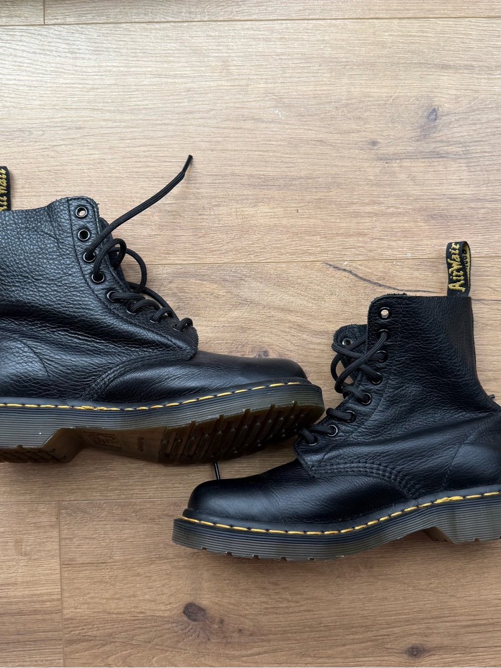 Dr. Martens Black Leather 8-Eye Lace-Up Boots with Yellow Stitching